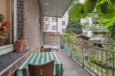 Altbau trifft Gartenidylle – Gartenwohnung mit großer Loggia und eigenem Garten - Überdachte Terrasse